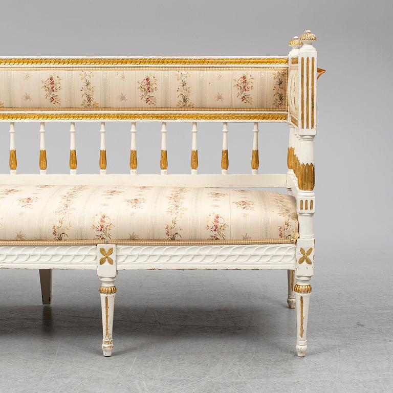 A late gustavian sofa, ca 1800.