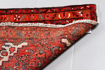 A Hosseinabad runner, 300 x 98 cm.