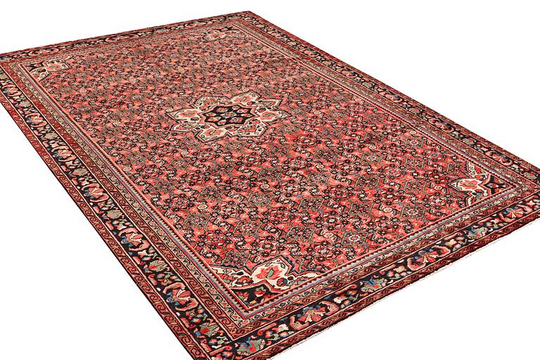 A carpet, Hosseinabad, ca. 348 x 248 cm.