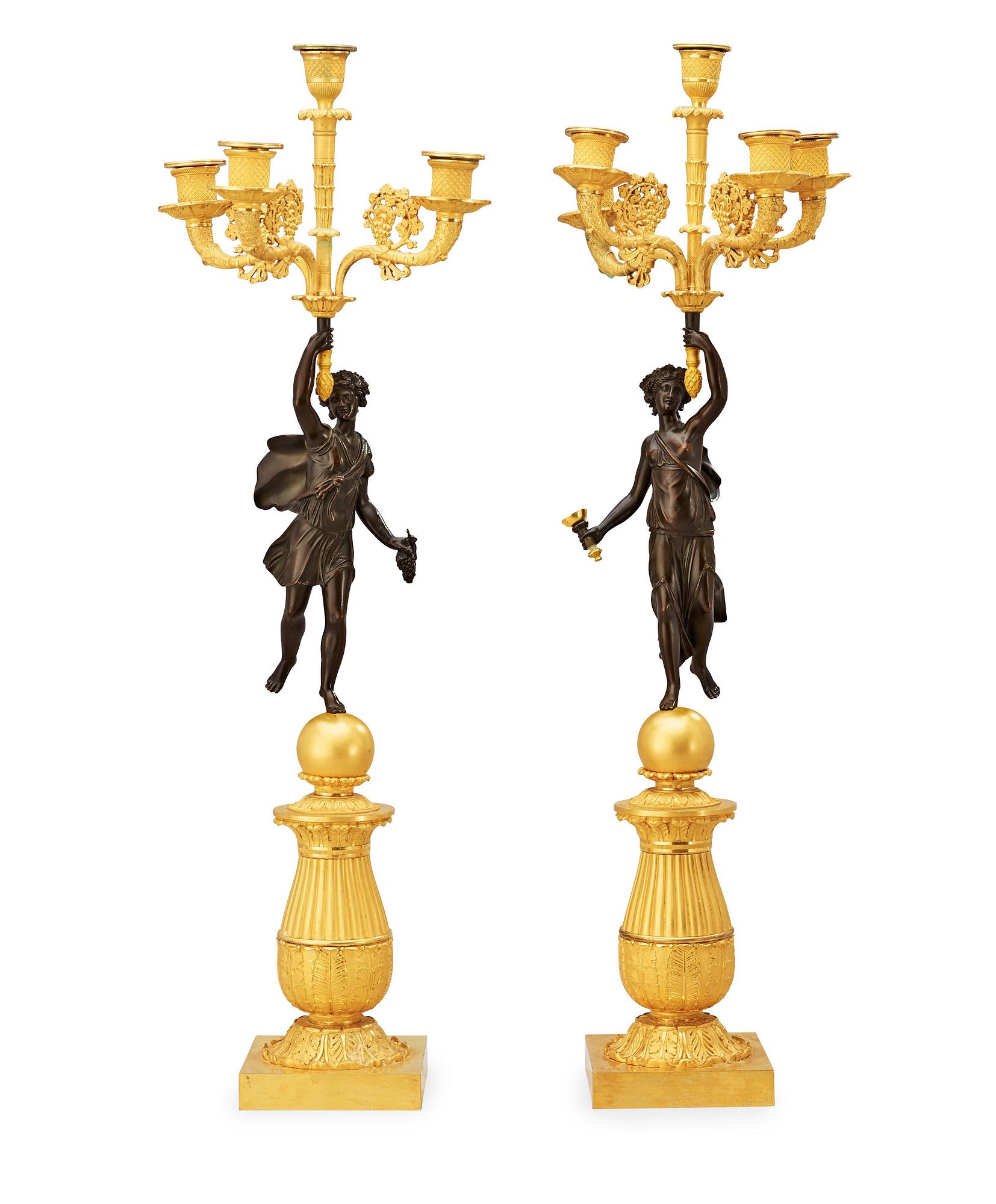 A pair of French Empire early 19th century five-light candelabra.