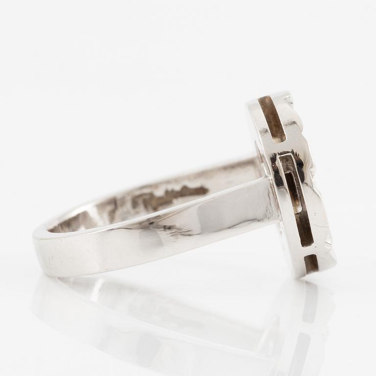 Rey Urban, ring, 18K white gold with brilliant-cut diamond 0.10 ct according to engraving. Stockholm 1977.