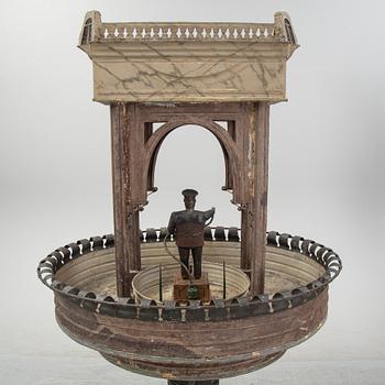 A painted and richly decorated plate garden fountain, late 19th century.
