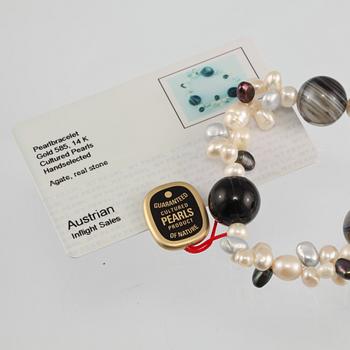 COLLIER SAMT ARMBAND, odlade pärlor, agatkulor samt lås i 14K guld.
