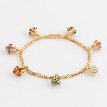 Gold and coloured stone charm bracelet.