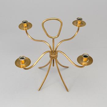 A brass candelabrum, mid 20th Century.