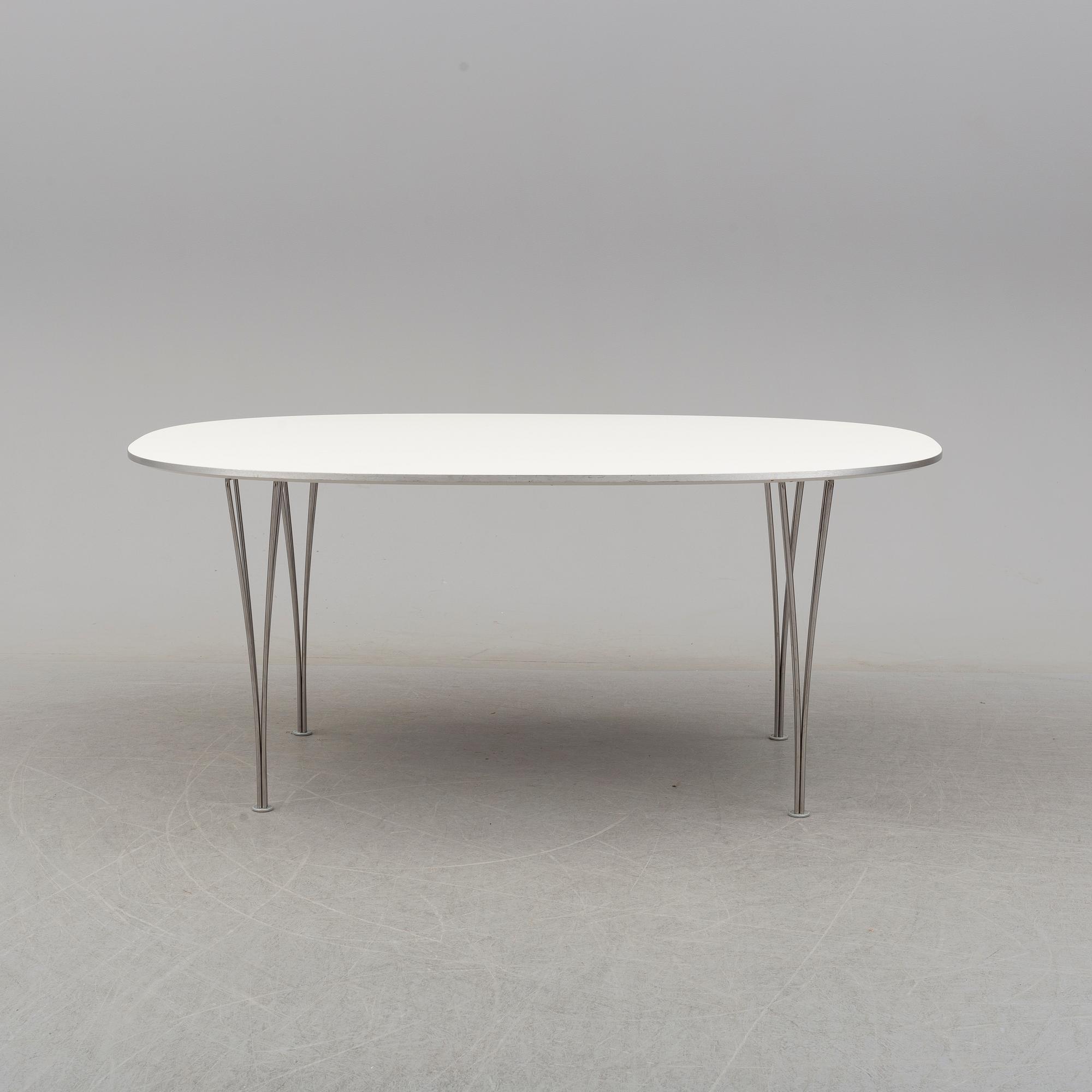 BRUNO MATHSSON & PIET HEIN, a 'Superellips' dining table from Fritz Hansen, Denmark, 2013.