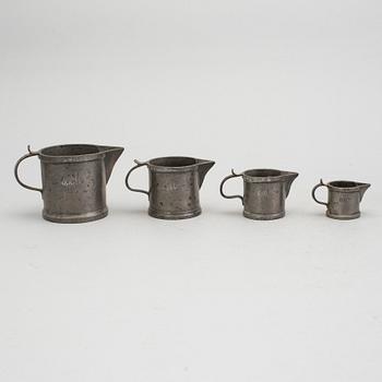 A set of seven tin items, 1800s.