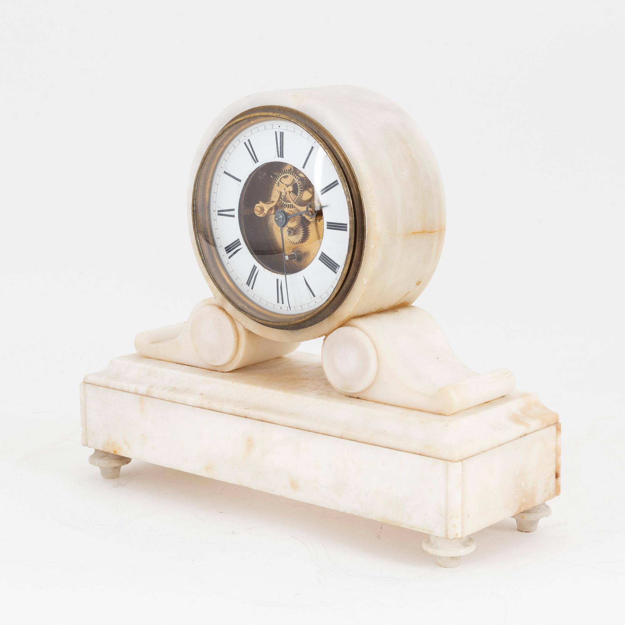 An alabaster mantle clock, early 20th Century.