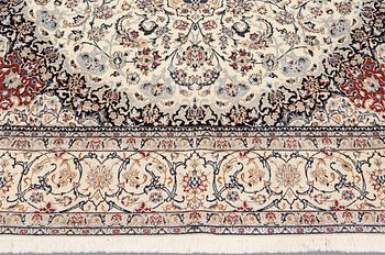 A Nain carpet, part silk, so-called 6LAA, c. 310 x 211 cm.