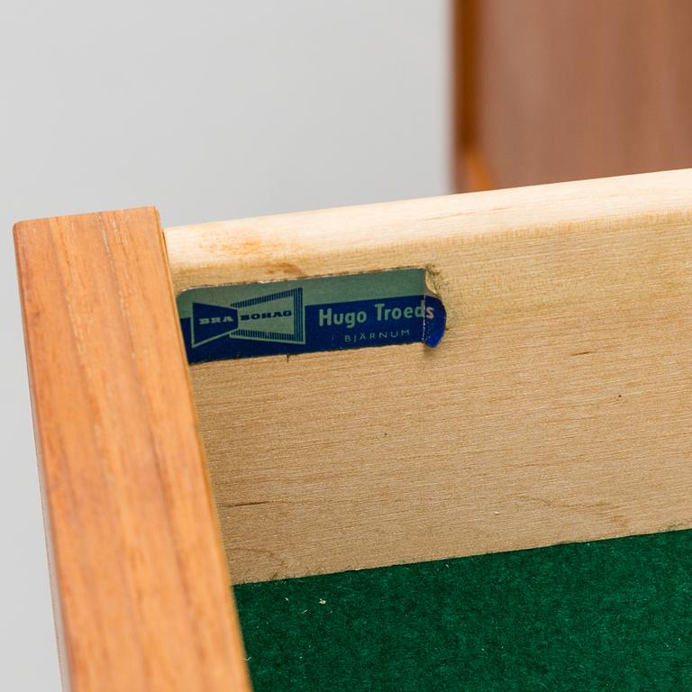 A 'Lyon' teak veneered sideboard designed by Nils Jonsson, Hugo Troeds Bjärnum, Sweden.