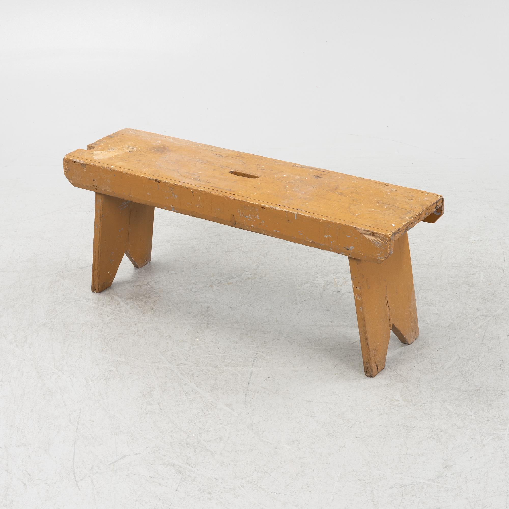 A painted bench, circa 1900.