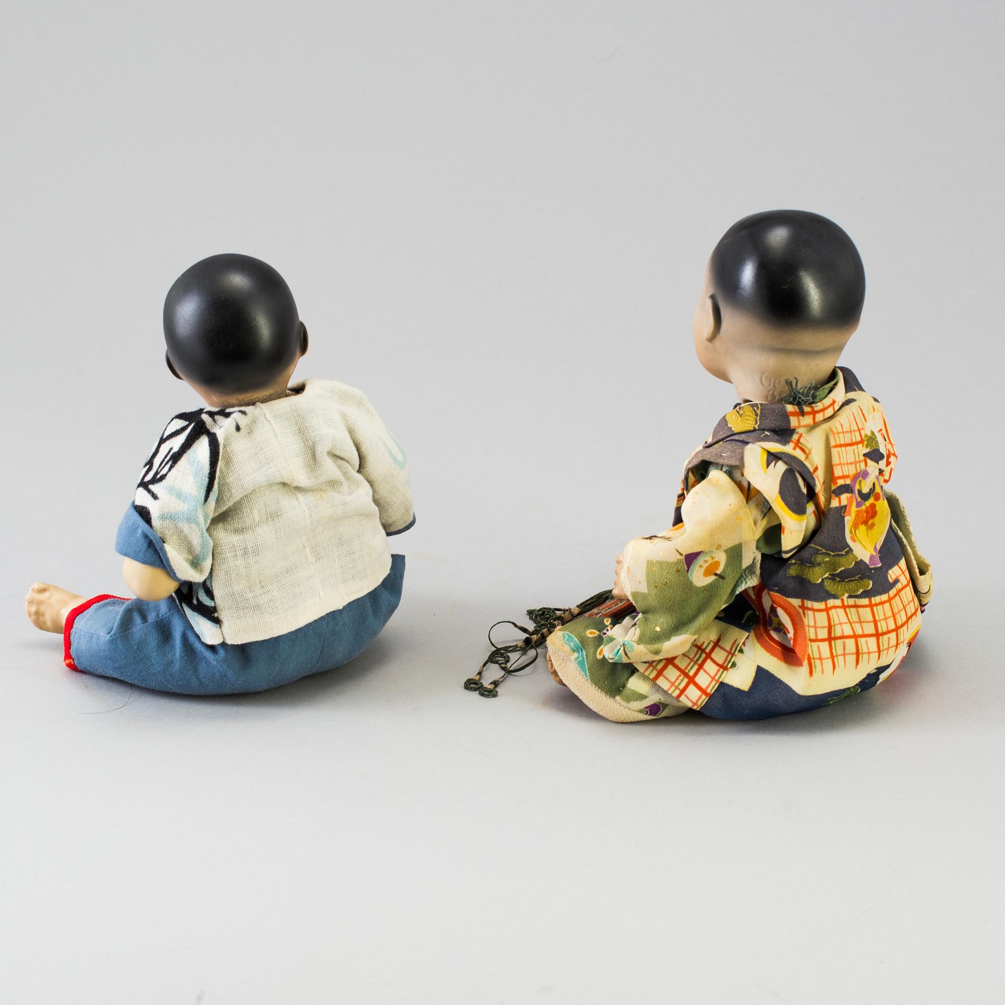 Two oriental bisque head baby dolls by Armand Marseille and Heubach Köppelsdorf, Germany, early 20th century.