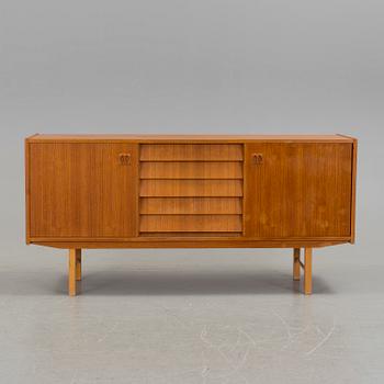 A 1960´s sideboard venereed in teak.