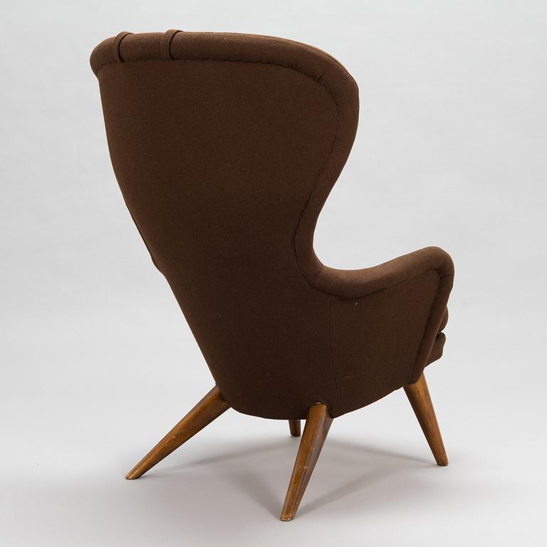 Carl Gustaf Hiort af Ornäs, A mid-20th-century armchair 'Siesta' manufacturer Puunveisto Oy - Träsnideri Ab, Finland.