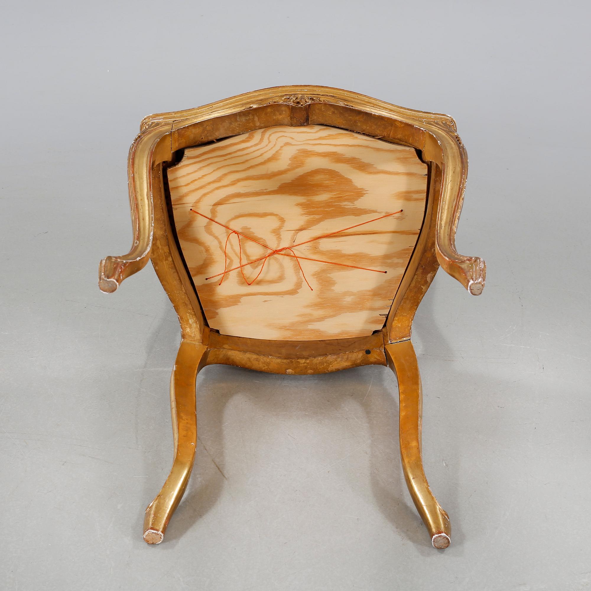 A pair of chairs from the first half of the 20th century.