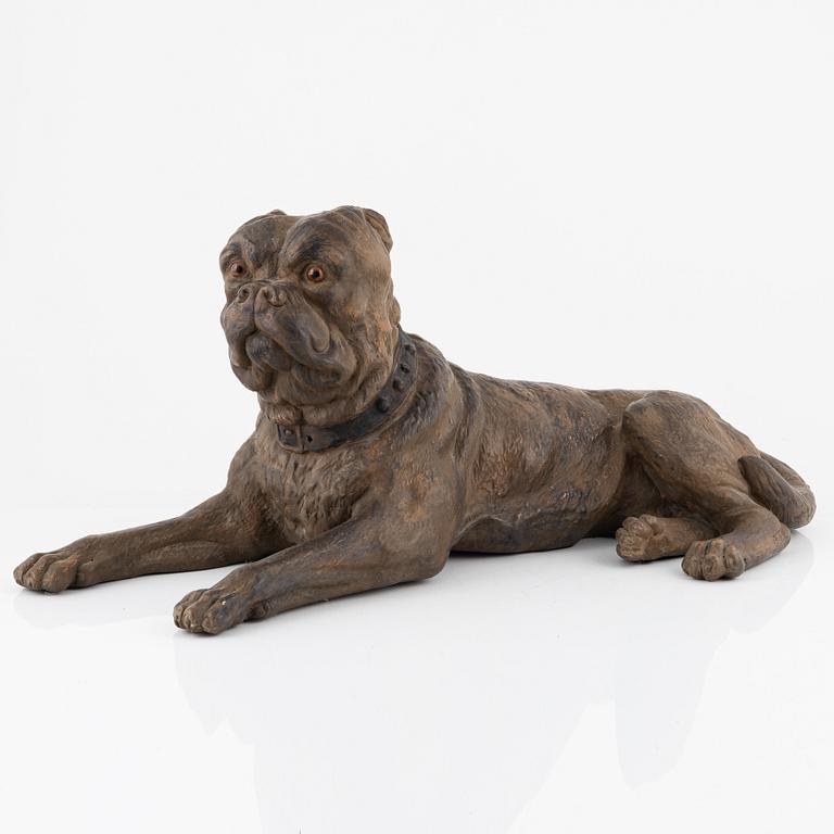 A ceramic sculpture of a dog, 20th century.