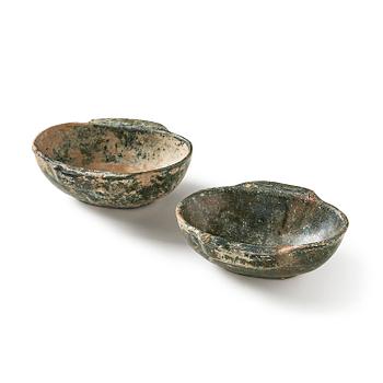 Two green glazed beakers, Han dynasty (206 B.C. - 220 A.D).