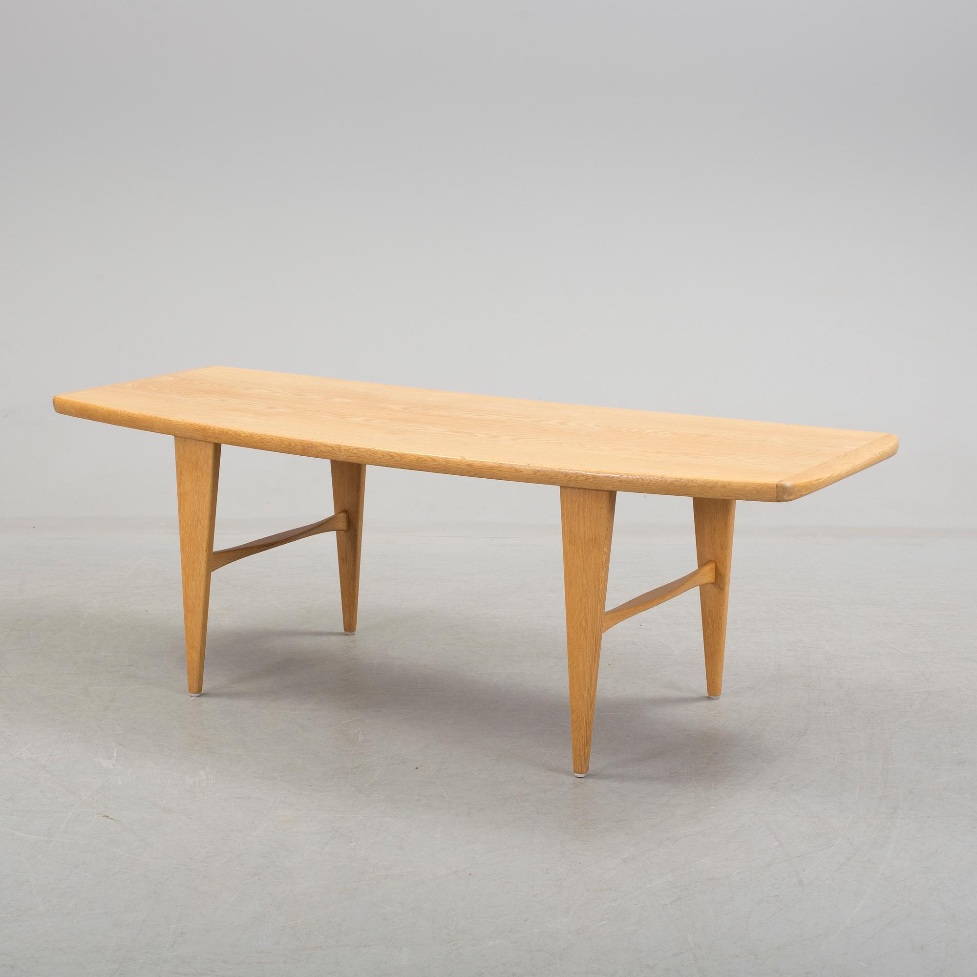 a Svante Skogh oak coffee table from Seffle Möbelfabrik, mid 20th century.