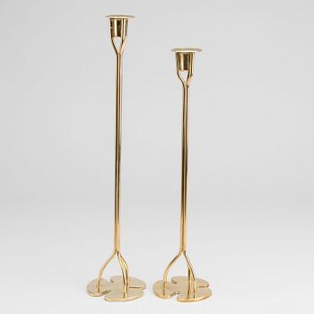 TWO BRASS CANDLESTICKS "KLÖVER" BY JOSEF FRANK FOR FIRMA SVENSKT TENN.