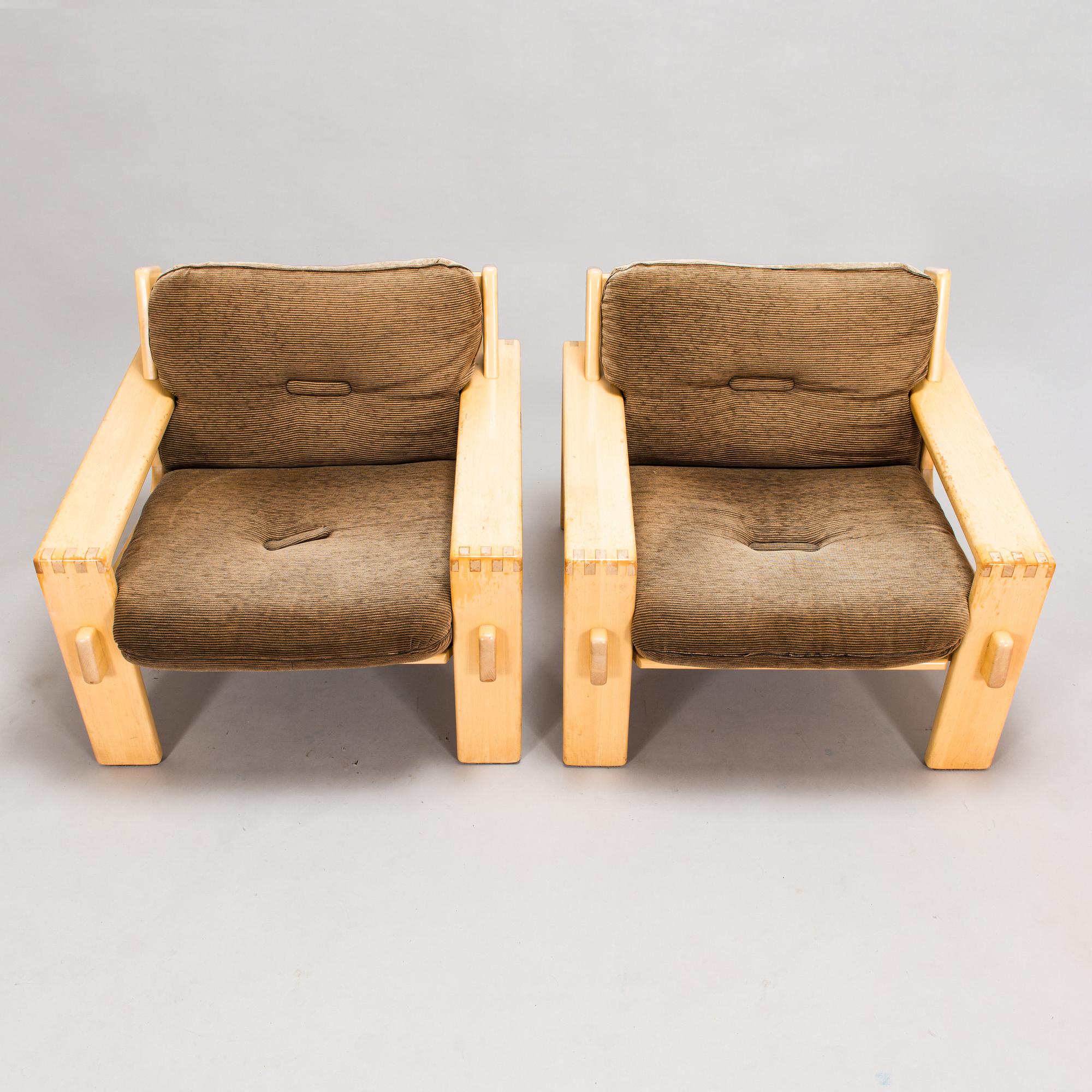 Esko Pajamies, A pair of 1970's 'Bonanza' armchairs, coffee table and sofa for Asko.