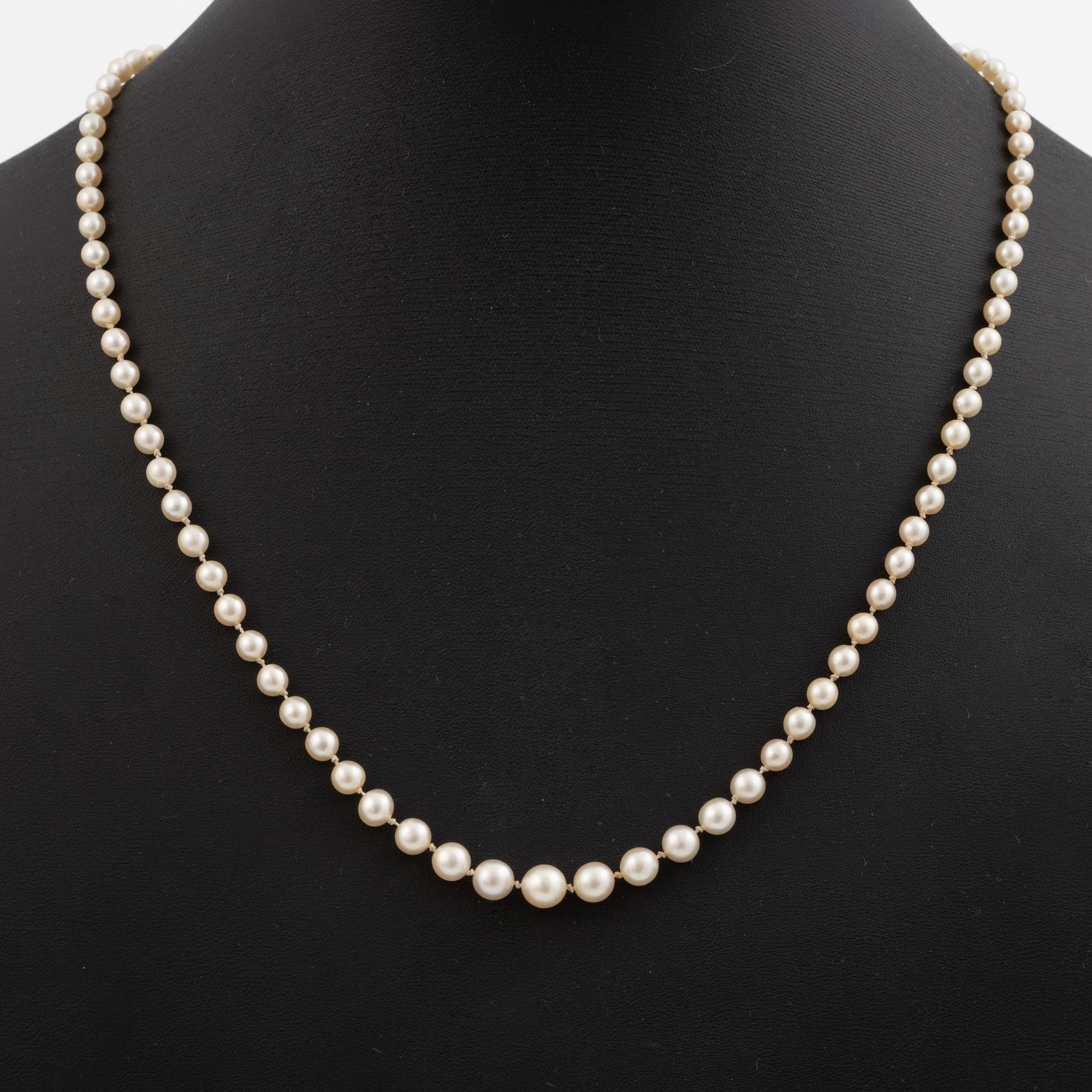 Necklace of cultured pearls, clasp in 14K gold set with old mine and rose-cut diamonds.