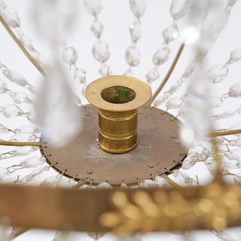 A late Gustavian gilt brass and cut glass seven-light chandelier, Stockholm, late 18th century.