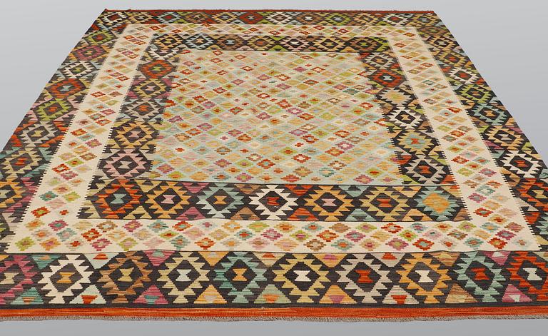 A carpet, Kilim, ca 304 x 263 cm.