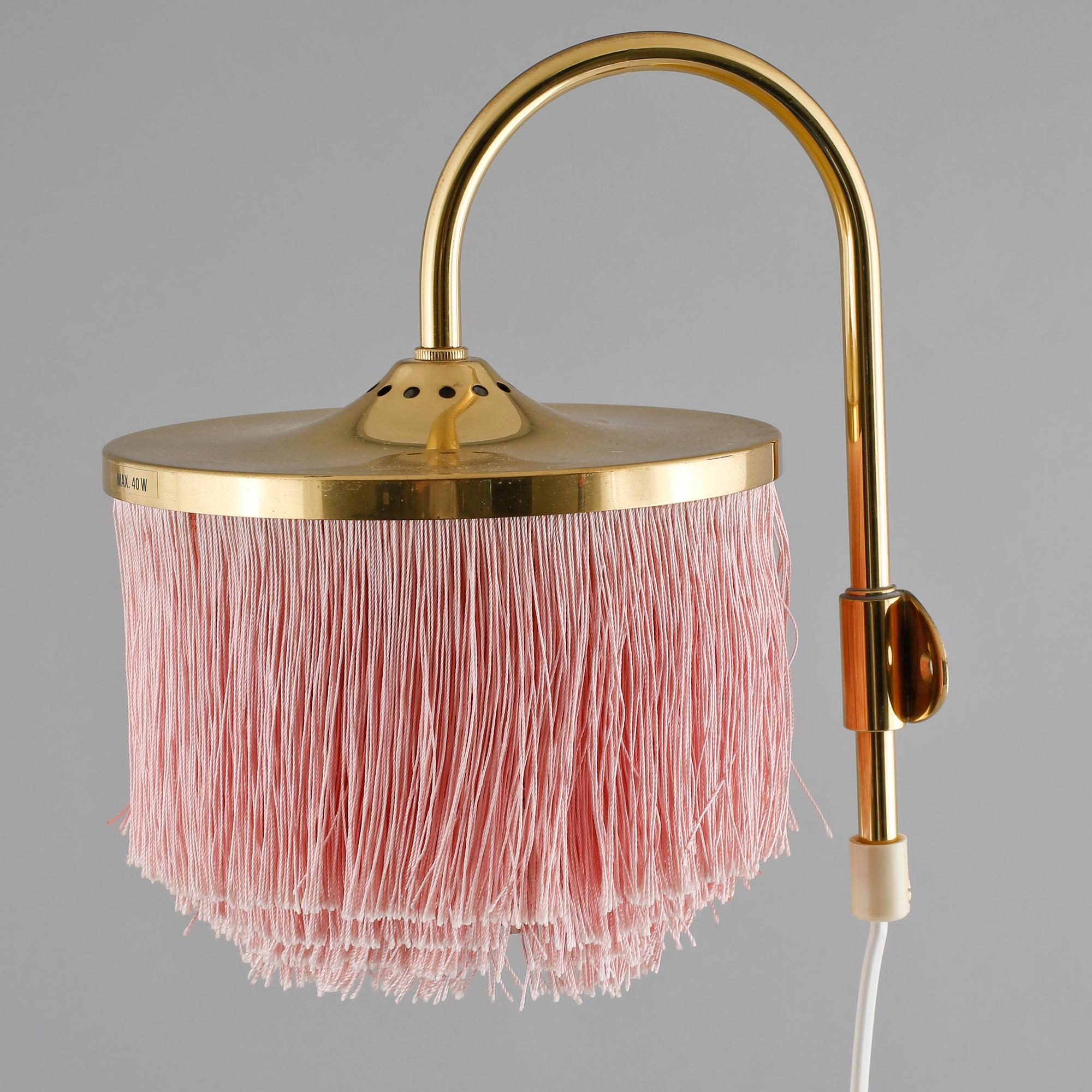 A pair of wall lamps by Hans-Agne Jakobsson for Markaryd from the second half of the 20th century.