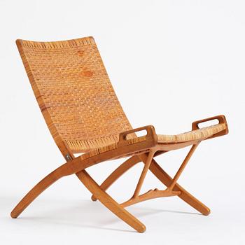 Hans J. Wegner, a foldable easy chair model 512, Johannes Hansen, Copenhagen, 1950s-60s.
