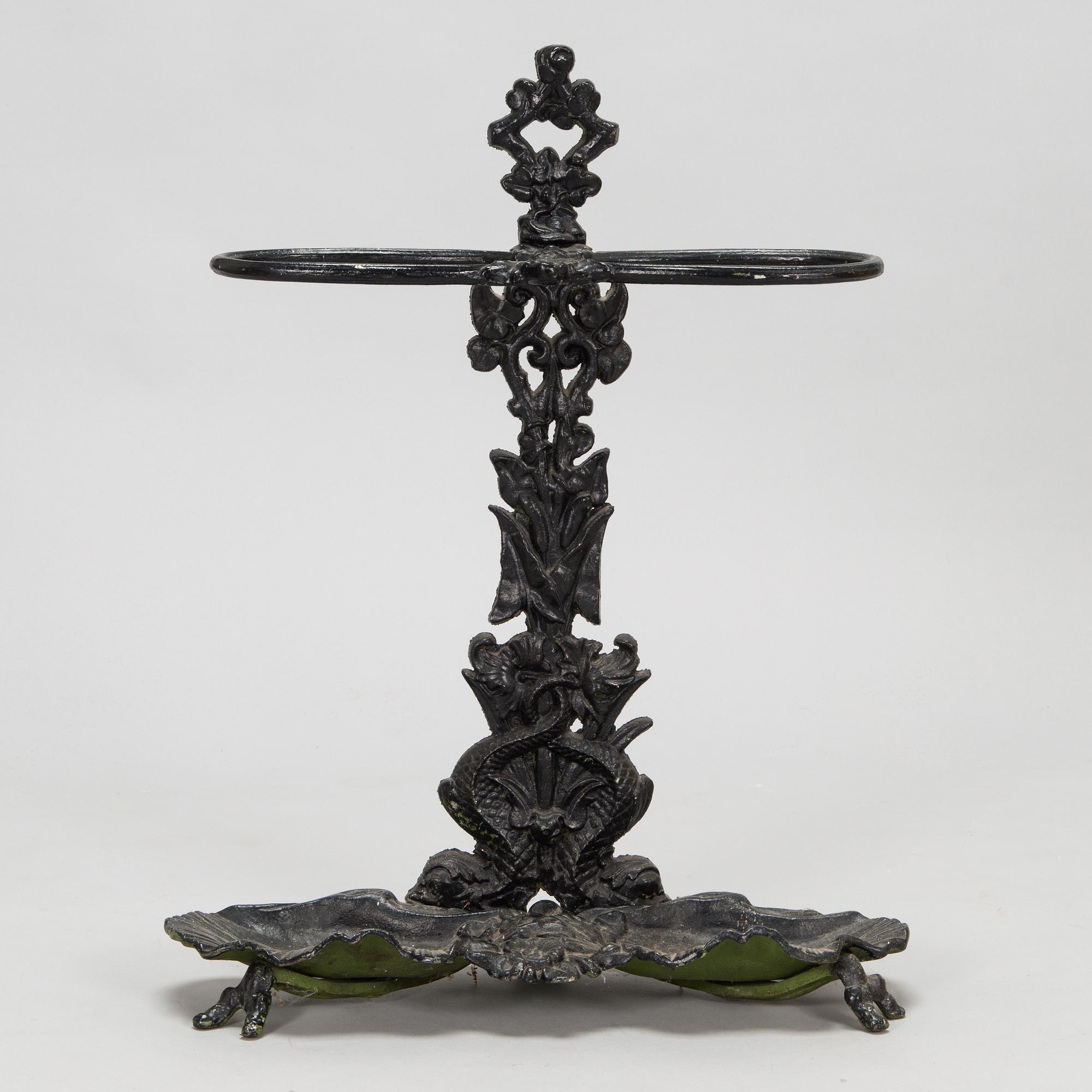 A cast iron umbrella stand, 20th Century.