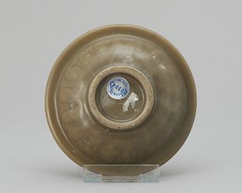 A celdon glazed dish with double fishes, Yuan/Ming dynasty.