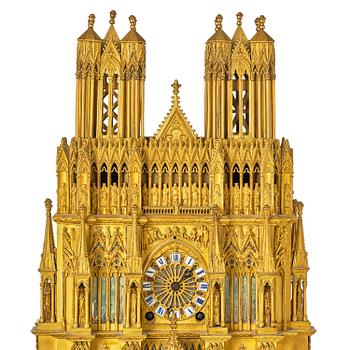 A Charles X ormolu mantel clock modelled as the Cathedral of Reims, Paris, 1820's.