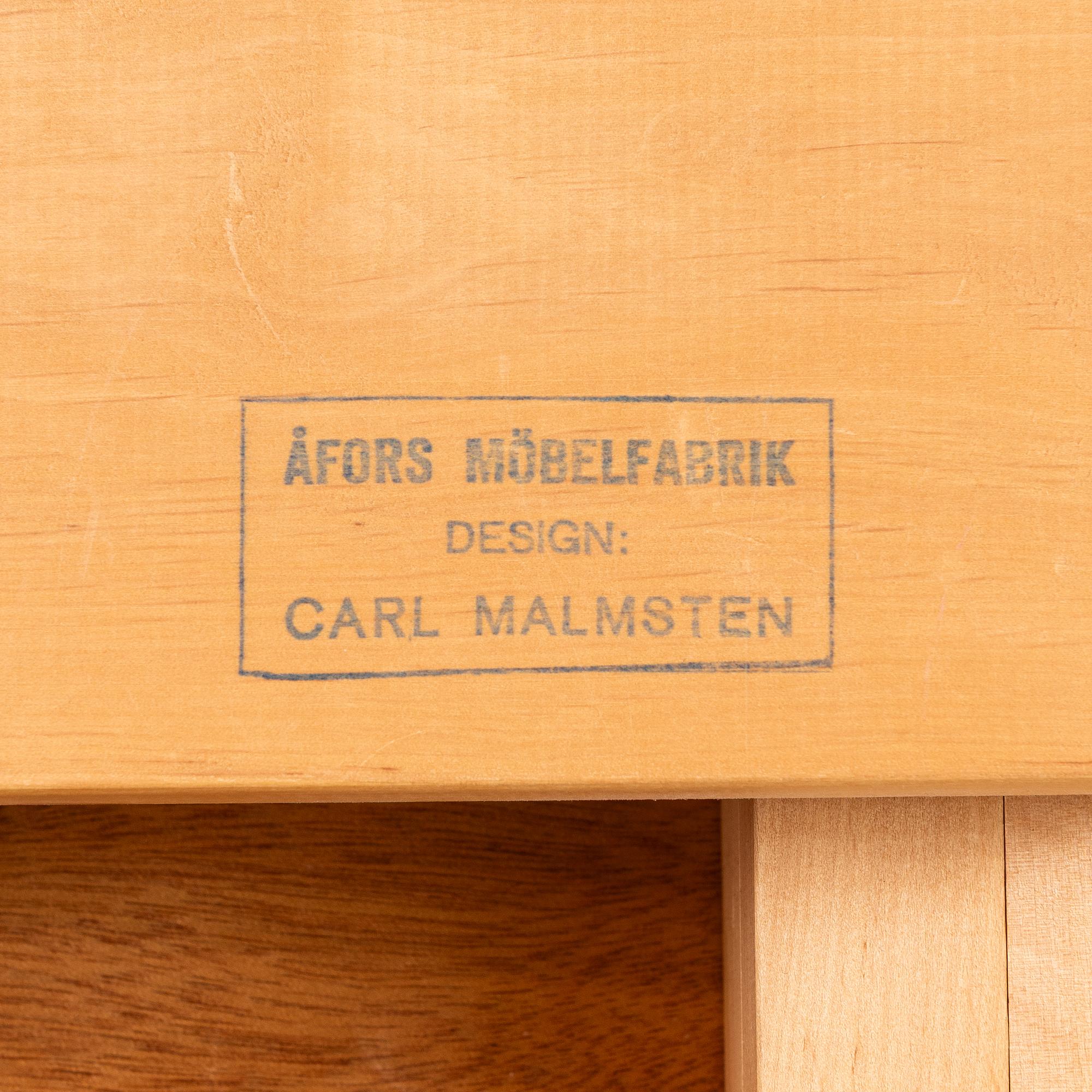 Carl Malmsten, Dining table with 2 armchairs and 6 chairs, 'Ambassador', Åfors Möbelfabrik, second half of the 20th century.