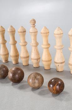 A nine-pin bowling set, 20th century.