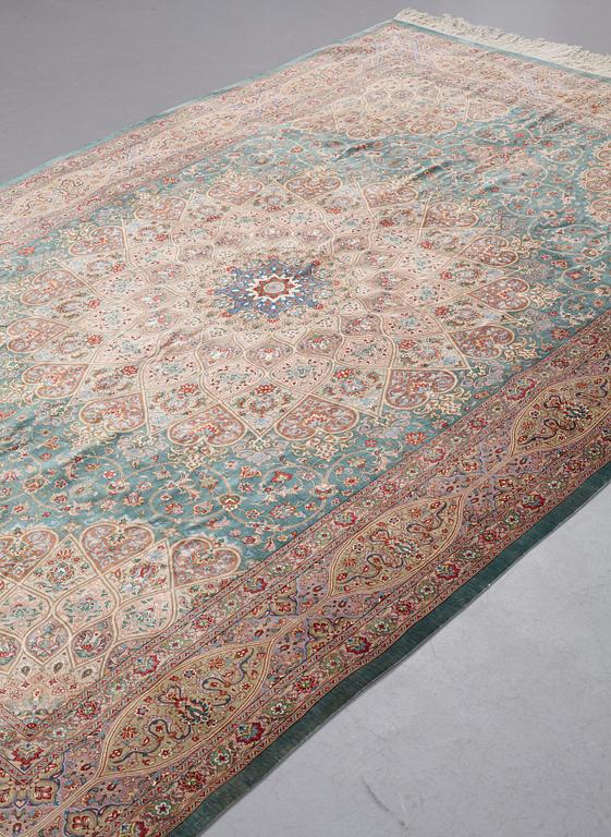 A CARPET, Old silk Qum, signed Moghadam, ca 309,5 x 190,5 - 193 cm.