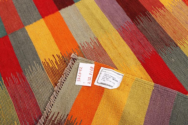 A Kilim rug, c. 232 x 168 cm.