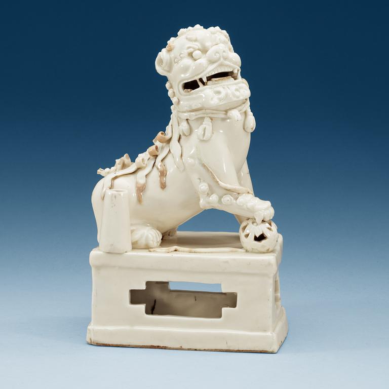 A blanc de chine censer, in the shape of a sitting Buddhist lion, Transition, 17th Century.