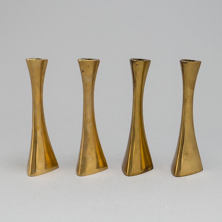 Four brass candle sticks by Karl Erik Ytterberg, 1960's.