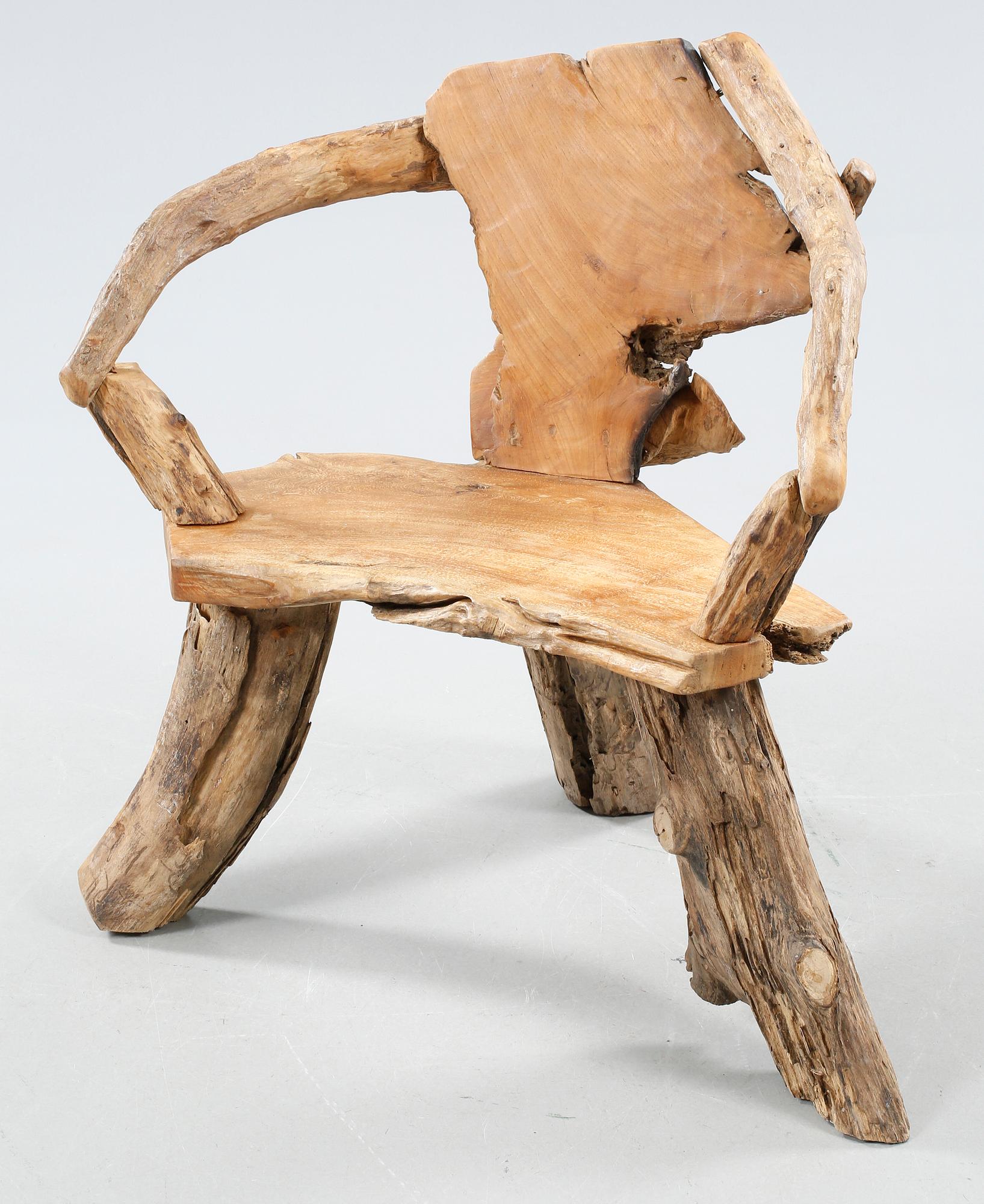 A wooden armchair, modern made.