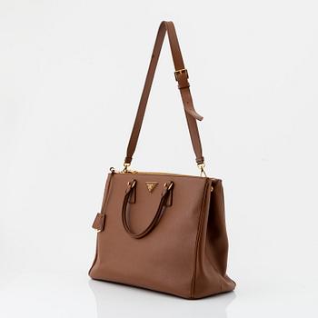 Prada, a brown Saffiano handbag.