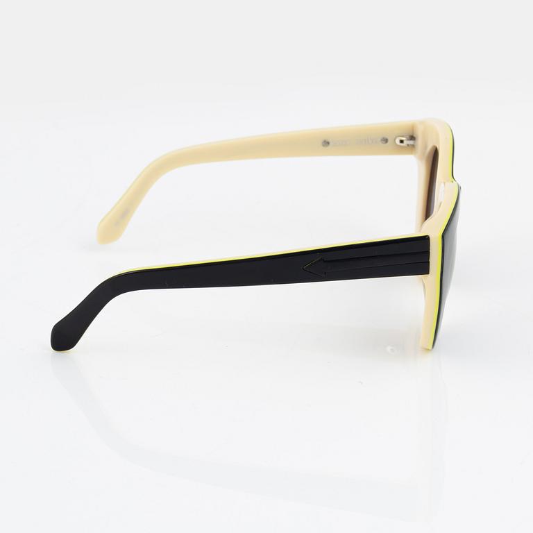 Karen Walker, a pair of "Anytime" sunglasses.