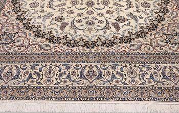 A Nain part silk carpet, 407 x 304 cm.
