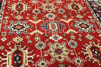 A carpet, Mamluk design, c. 308 x 242 cm.