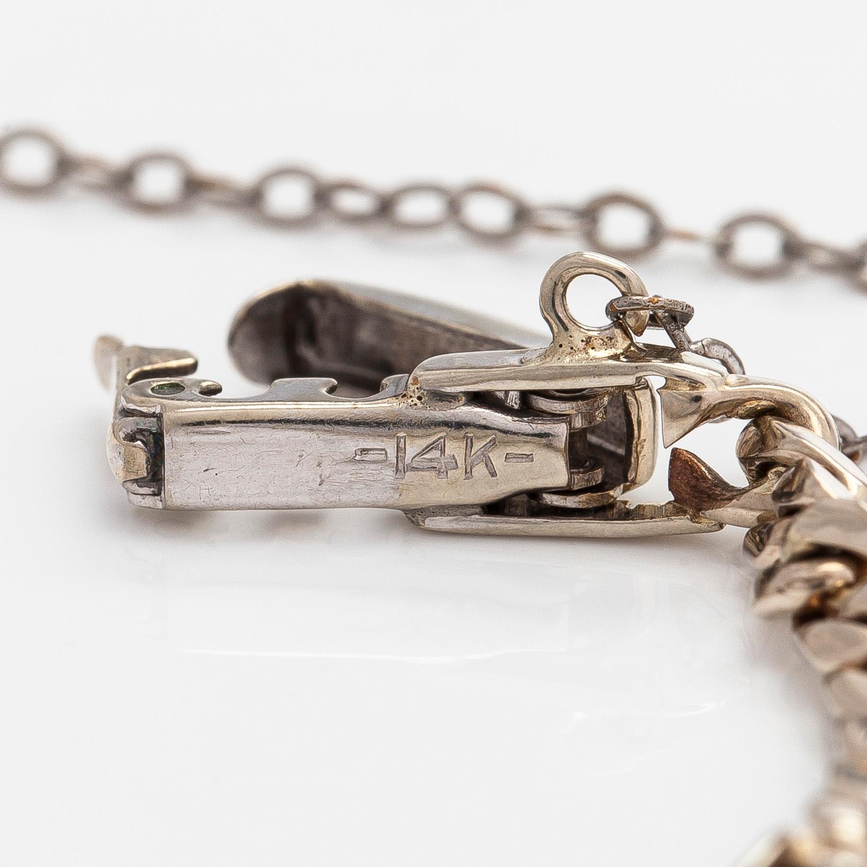 Rannekoru, 14K valkokultaa, 8/8 hiottuja timantteja.