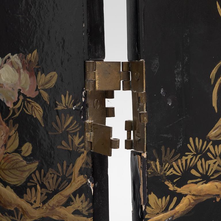 A wooden lacquer screen, 20th century.