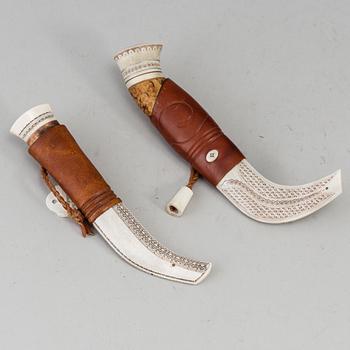 Two Sami reindeer horn knives, one Per-Erik Nilsson, one signed JL.