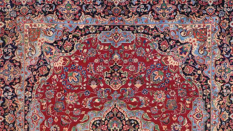 A CARPET, Kashmar, signed, around 380 x 292 cm.