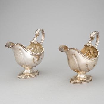 A PAIR OF SAUCE BOATS, silver, London1764. Weight 1017 grams.