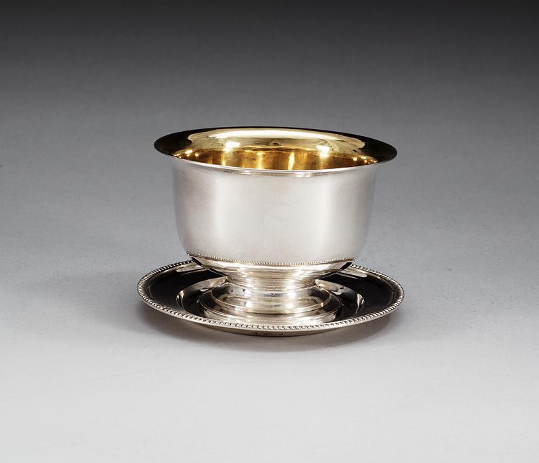 A Swedish 19th century parcel-gilt sauce-bowl, makers mark of Johan Fredrik Björnstedt, Stockholm 1825 and 1826.