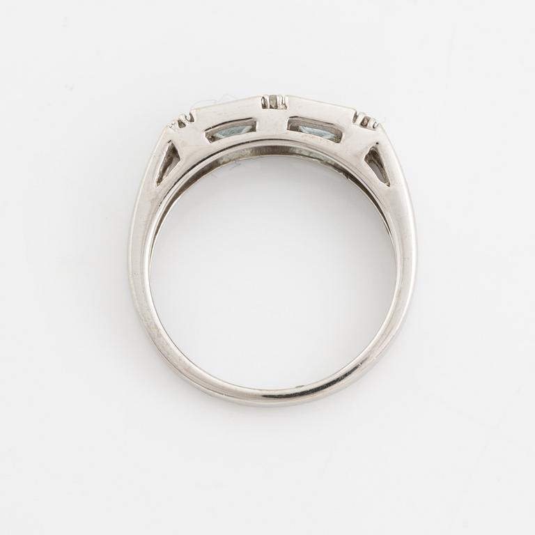 Ring, pendant, and a pair of earrings, 18K white gold with topaz and small diamonds.